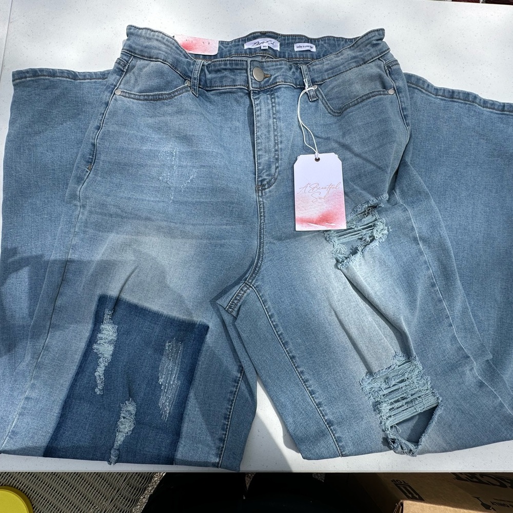 Distressed Blue Boyfriend Jeans with Light Wash